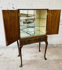 An attractive & Useful Early 20th Century Drinks Cabinet With Removable Shelves.