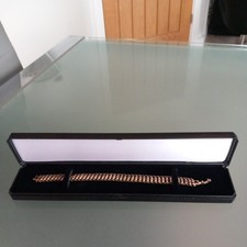 VINTAGE LADIES ROLLED ROSE