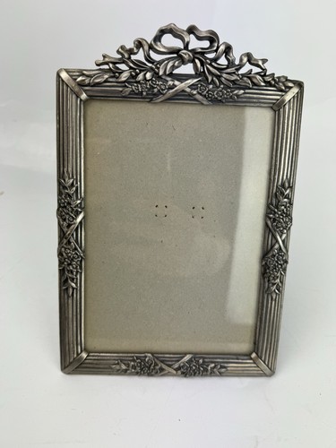 Pewter effect free standing - free,