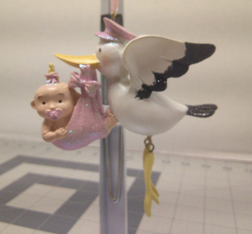 Stork carrying baby girl - stork,
