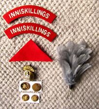GENUINE ‘ROYAL INNISKILLING FUSILIERS’ CLOTH, BUTTONS & BADGE SET