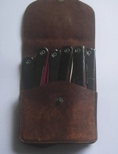 VINTAGE  LEATHER CASE WITH FIVE TRAVEL FOLDING COAT HANGERS