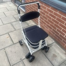 Brand New Seated Walking aid