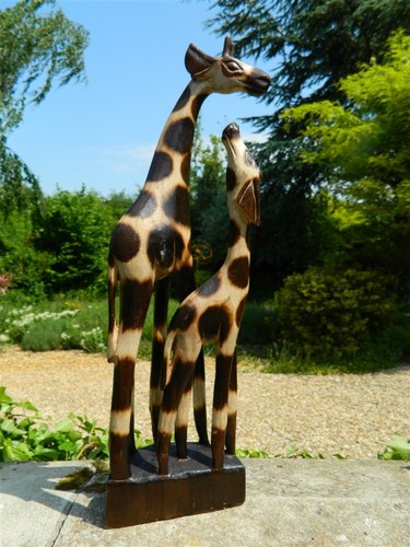 Wooden giraffe carving - carving,