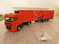 A BOXED DAF XF TRUCK & TRAILER (MORA) BY LION-TOYS VG CONDITION