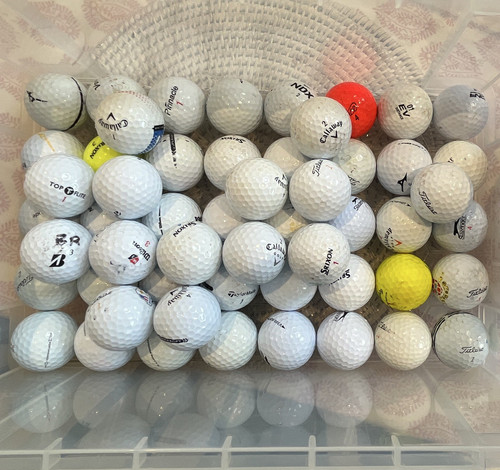 Assortment used golf balls - used,