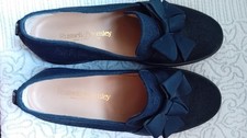 Black flat Russell and Bromley