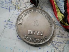 Sports shooting medal district