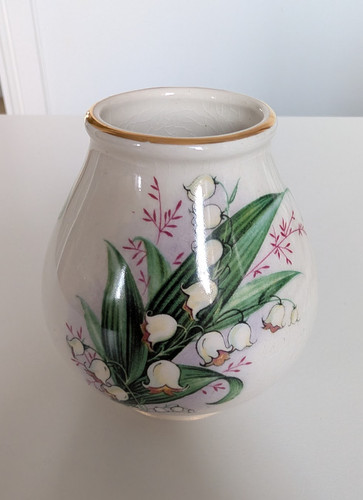 Ceramic vase featuring - vase, a