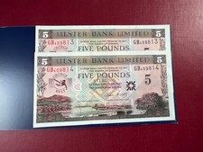 Two Genuine limited edition George Best £5 notes with original wallets.UNC.