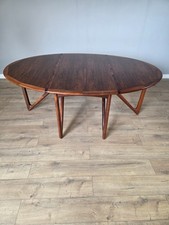 1970's Danish Rosewood Oval Drop Leaf Table by Kurt Ostervig