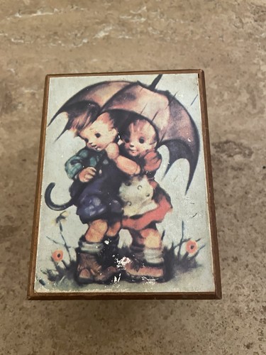 Hummel style music box plays - box,