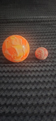 Small orange bouncy balls - 2,