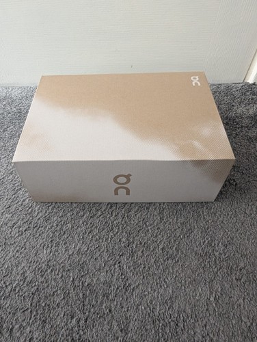 Empty running shoe box - on,