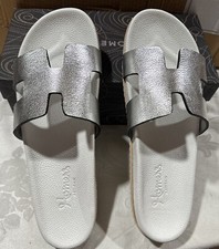 Homers  Woman’s  Slipper