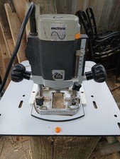 ELU MOF 96 ON WOODRAT JOINERY PLATES ROUTER CUTTERS.