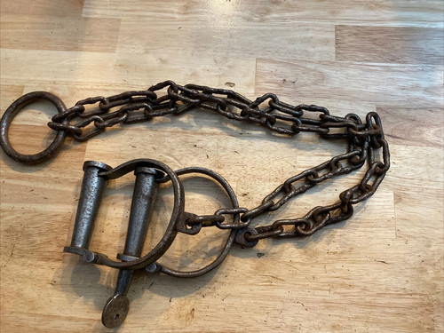 Rust prison handcuffs antique - prison,