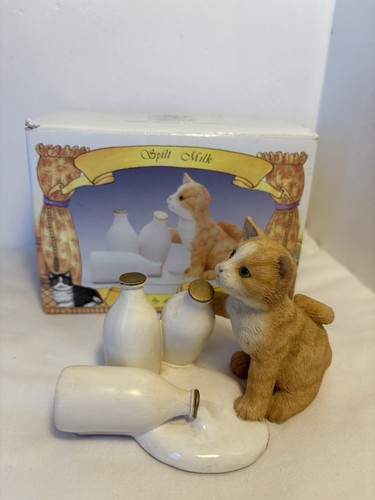 Cat figurine spilt milk - figurine.,