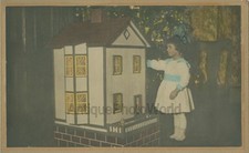 Cute girl by huge doll house toy antique Christmas hand tinted photo