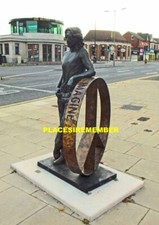 John lennon statue penny - john,