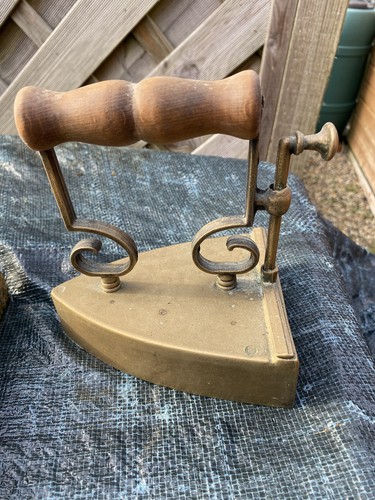 Vintage brass flat iron with - ,