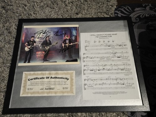 Fully signed photo with - u2,