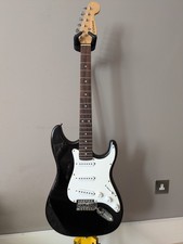 CG Giant. Electric Guitar Beginner. 4/4.  Black and White