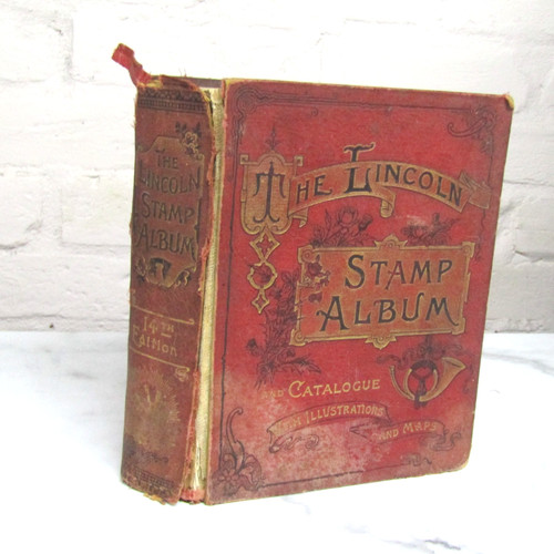 Lincoln stamp album red - lincoln,