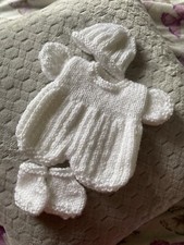 Hand Knitted dolls clothes to