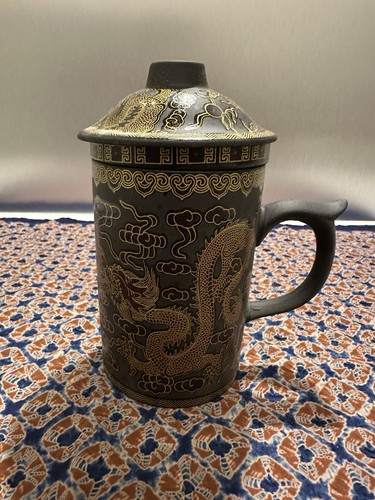 Yixing clay mug with tea - clay,