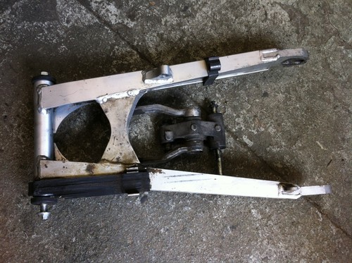 Swingarm with deflection box