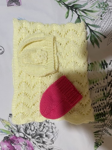 Beautiful hand knitted baby - hand,