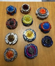 Beyblade Bundle - 11 Spinners + accessories