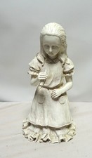 Alice in wonderland figurine