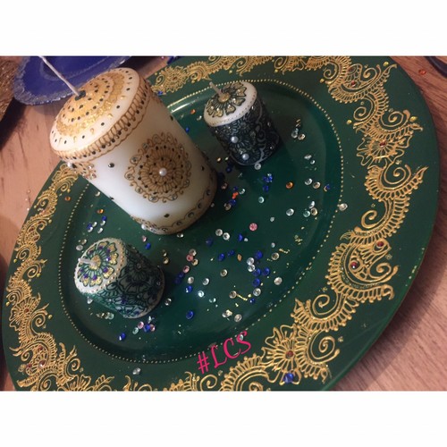 Mehndi plates and candles - and,