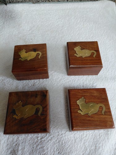Four new wooden trinket - new,