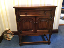 small immaculate oak Priory cupboard