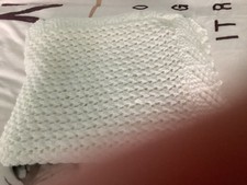 Hand knitted baby shawl