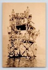 Beach RPPC: German Boys & Girls Hanging Off A Diving Board. Bathing Suits.