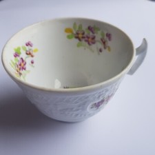 Georgian New Hall Pottery c1820s ceramic white relief tea cup flower English 