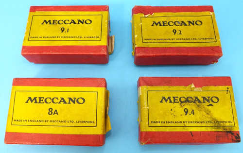 Four red cardboard meccano - four,