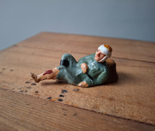   Elastolin/Lineol like type German Army Wounded Soldier lying down.
