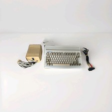 Retro Amiga 600 Commodore A600 With Power Pack and Video Lead. Partial tested 