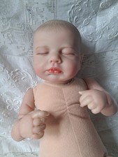 Realistic baby doll