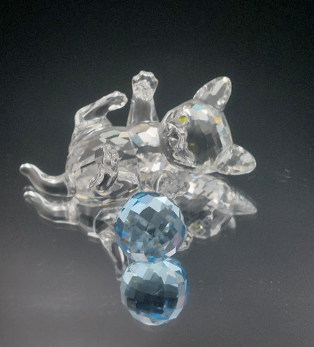 Swarovski kitten lying with - lying,