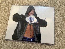 AJ Styles Autographed Photo WWE Wrestling Signed 8x10 Champion Blue Gloves Pose
