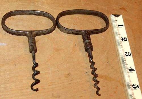 Two old corkscrews - two,
