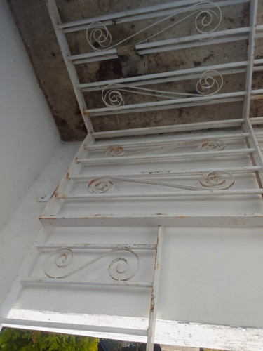 Wrought iron window grills - window,