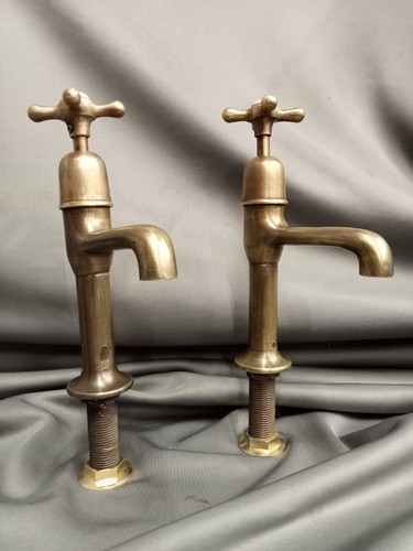 Aged bare brass pillar taps - pillar,