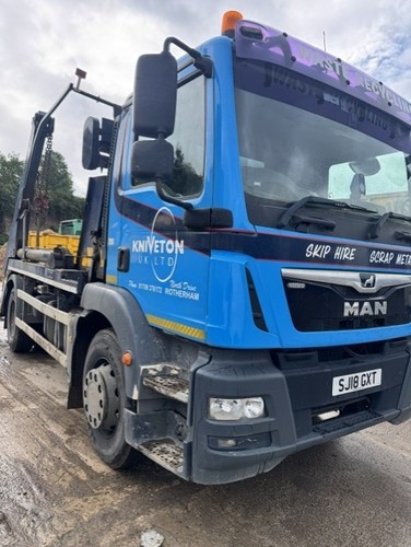 Man skip lorry - skip,